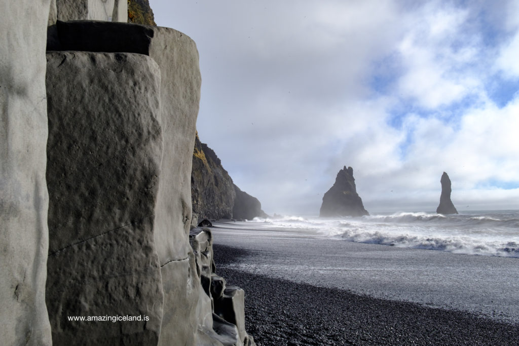 Reynisdrangar rock formation at black sand beach in Iceland