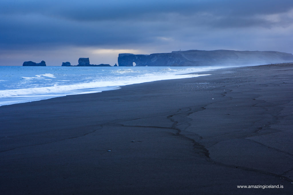 Black sand beach and Dyrholaey in South coast of Iceland
