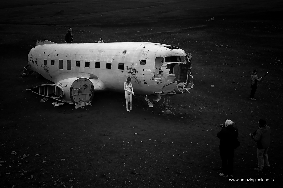 Nude photography by Douglas C-117 Plane wreck on Sólheimasandur on south coast of Iceland