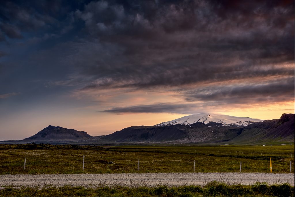Sun setting over Snæfellsjökull glacier in Snæfellsnes Iceland