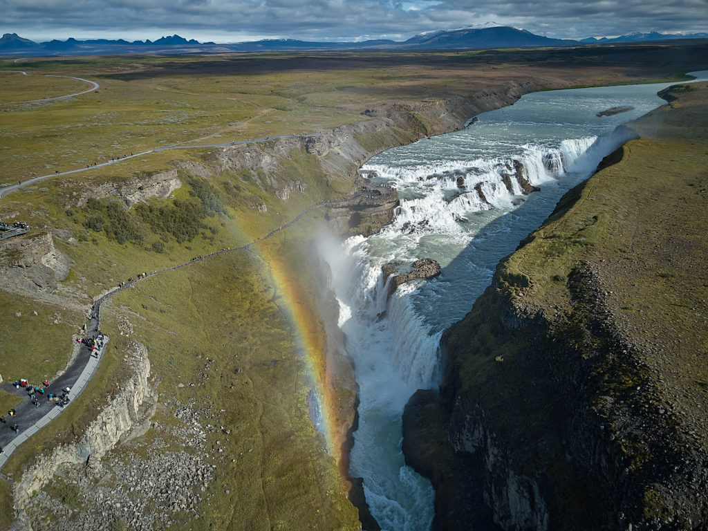 Arial photo of Gullfoss waterfall with rainbow