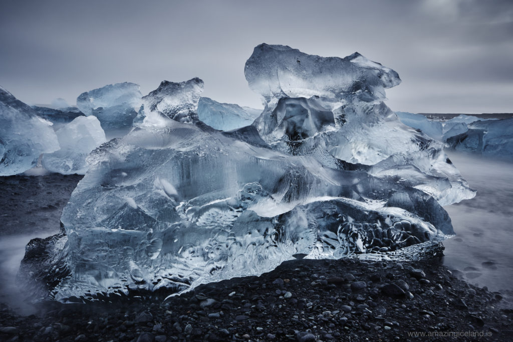 Transparent big Ice block on Diamond beach in Iceland