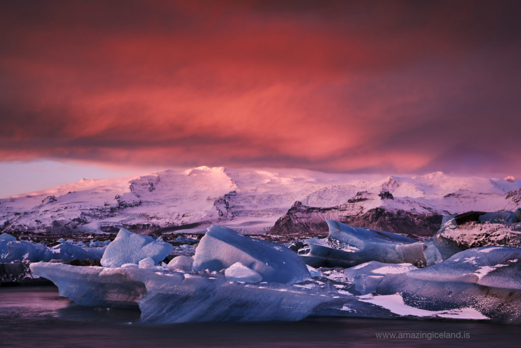 Glowing red Morning light at Glacier Lagoon in Iceland
