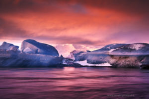 Red silky morning light glow at Glacier Lagoon in south east Iceland