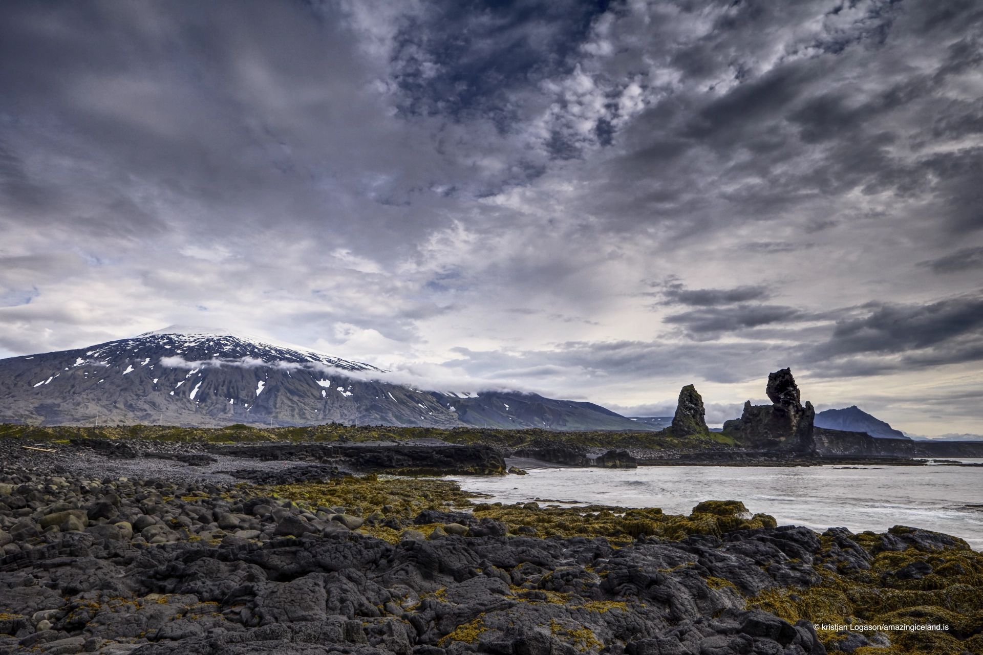 Lóndrangar basalt columns and Snæfellsjökull volcano in Snæfellsnes national park