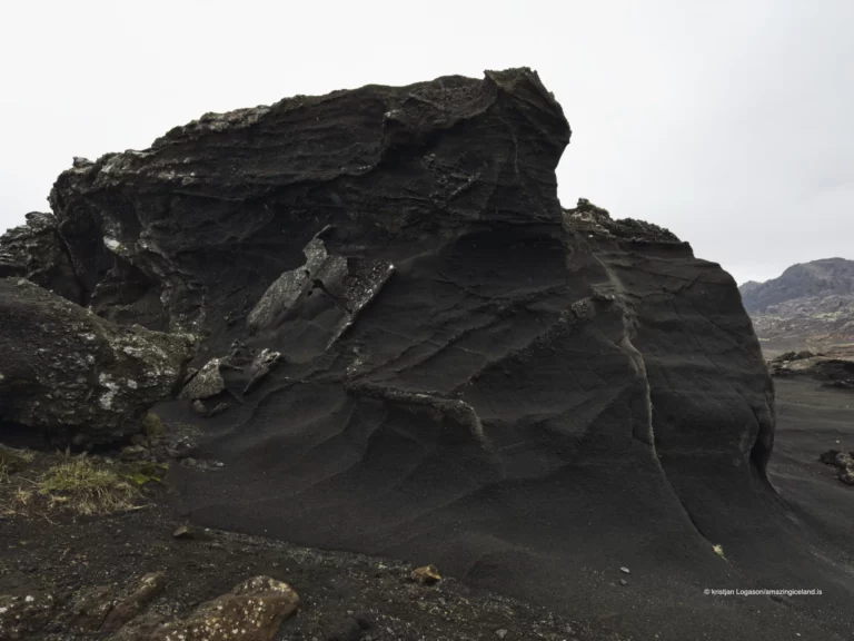 Weathered rocks by lake Kleifarvatn creating sculpture like formations