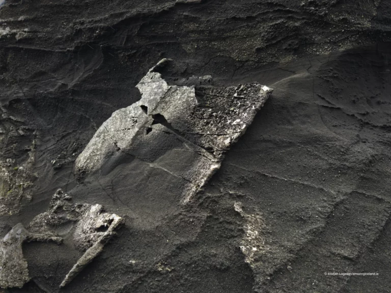 Weathered rocks by lake Kleifarvatn creating sculpture like formations