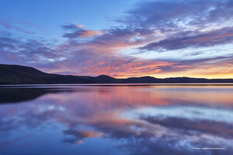 Reflection of a colorful sunset on Lake Kleifarvatn in Reykjanes peninsula in Iceland