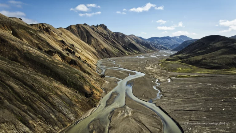 Landmannalaugar is one of Iceland’s most geologically expressive landscapes: a highland basin of rhyolite mountains, lava fields, geothermal activity, and braided rivers within the Fjallabak Nature Reserve. Located at the northern end of F208, the area is internationally known for its colour-rich mountains and natural hot spring, but its deeper significance lies in how clearly it reveals the interaction between volcanism, tectonics, water, and time.