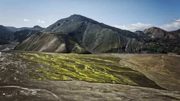 Landmannalaugar is one of Iceland’s most geologically expressive landscapes: a highland basin of rhyolite mountains, lava fields, geothermal activity, and braided rivers within the Fjallabak Nature Reserve. Located at the northern end of F208, the area is internationally known for its colour-rich mountains and natural hot spring, but its deeper significance lies in how clearly it reveals the interaction between volcanism, tectonics, water, and time.