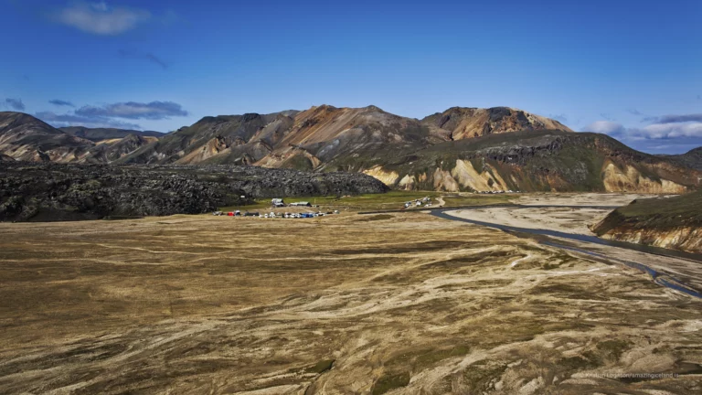 Laugahraun is a young basaltic lava field at Landmannalaugar, formed during the 1477 Veiðivötn eruption. Dark, fractured, and still sharply textured, it stands in direct contrast to the surrounding rhyolite mountains and geothermal slopes. More than a backdrop, Laugahraun is a defining structural element of the Landmannalaugar landscape, shaping access, water flow, and human movement through the area.