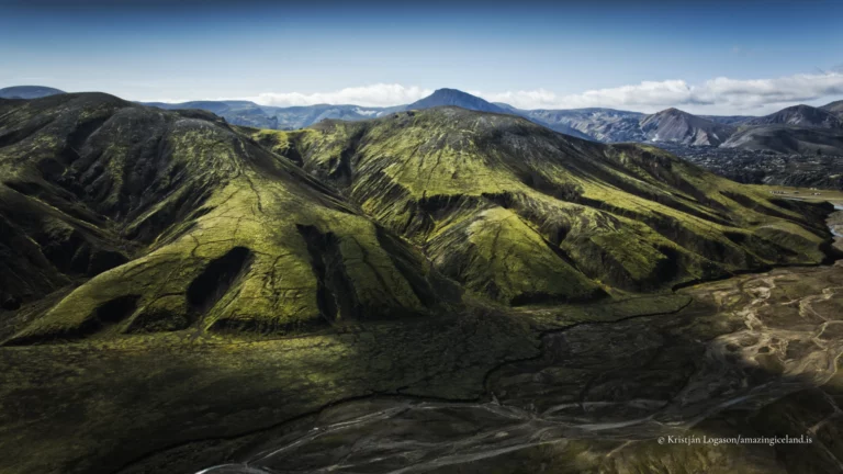 Landmannalaugar is one of Iceland’s most geologically expressive landscapes: a highland basin of rhyolite mountains, lava fields, geothermal activity, and braided rivers within the Fjallabak Nature Reserve. Located at the northern end of F208, the area is internationally known for its colour-rich mountains and natural hot spring, but its deeper significance lies in how clearly it reveals the interaction between volcanism, tectonics, water, and time.
