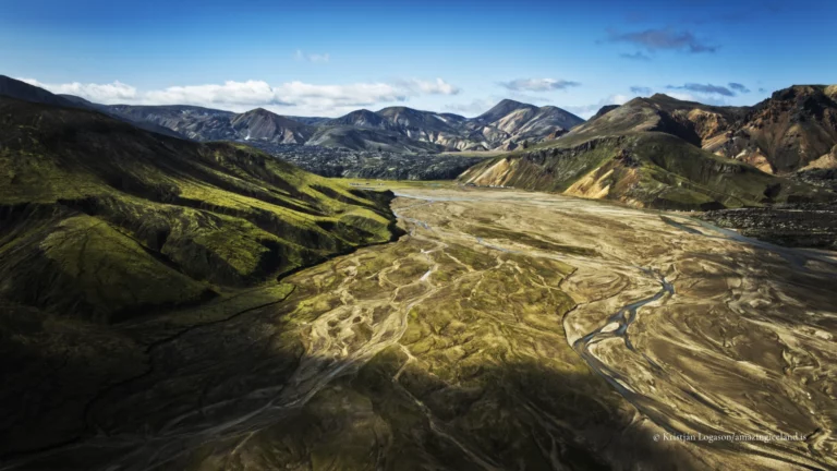 Landmannalaugar is one of Iceland’s most geologically expressive landscapes: a highland basin of rhyolite mountains, lava fields, geothermal activity, and braided rivers within the Fjallabak Nature Reserve. Located at the northern end of F208, the area is internationally known for its colour-rich mountains and natural hot spring, but its deeper significance lies in how clearly it reveals the interaction between volcanism, tectonics, water, and time.