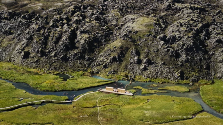Laugahraun is a young basaltic lava field at Landmannalaugar, formed during the 1477 Veiðivötn eruption. Dark, fractured, and still sharply textured, it stands in direct contrast to the surrounding rhyolite mountains and geothermal slopes. More than a backdrop, Laugahraun is a defining structural element of the Landmannalaugar landscape, shaping access, water flow, and human movement through the area.