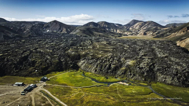 Laugahraun is a young basaltic lava field at Landmannalaugar, formed during the 1477 Veiðivötn eruption. Dark, fractured, and still sharply textured, it stands in direct contrast to the surrounding rhyolite mountains and geothermal slopes. More than a backdrop, Laugahraun is a defining structural element of the Landmannalaugar landscape, shaping access, water flow, and human movement through the area.