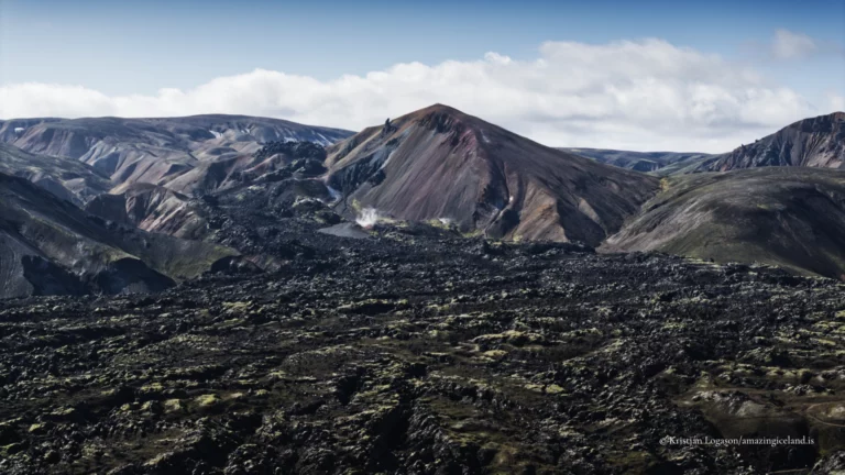 Brennisteinsalda is one of the most distinctive mountains in Landmannalaugar, rising directly above the geothermal basin and trail network of the Fjallabak Nature Reserve. Known for its strong colour contrasts and active geothermal alteration, the mountain offers a clear, close-range view of rhyolitic volcanism and surface processes that continue to shape the landscape today.