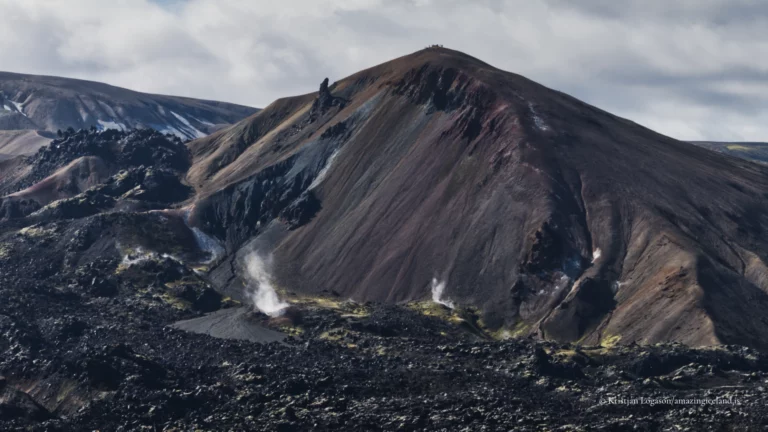 Brennisteinsalda is one of the most distinctive mountains in Landmannalaugar, rising directly above the geothermal basin and trail network of the Fjallabak Nature Reserve. Known for its strong colour contrasts and active geothermal alteration, the mountain offers a clear, close-range view of rhyolitic volcanism and surface processes that continue to shape the landscape today.