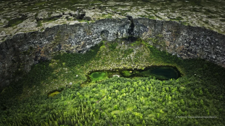 Ásbyrgi is a canyon that resists ordinary explanation at first glance.